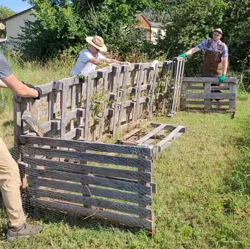 Volunteers building compost bins at Flat Rock