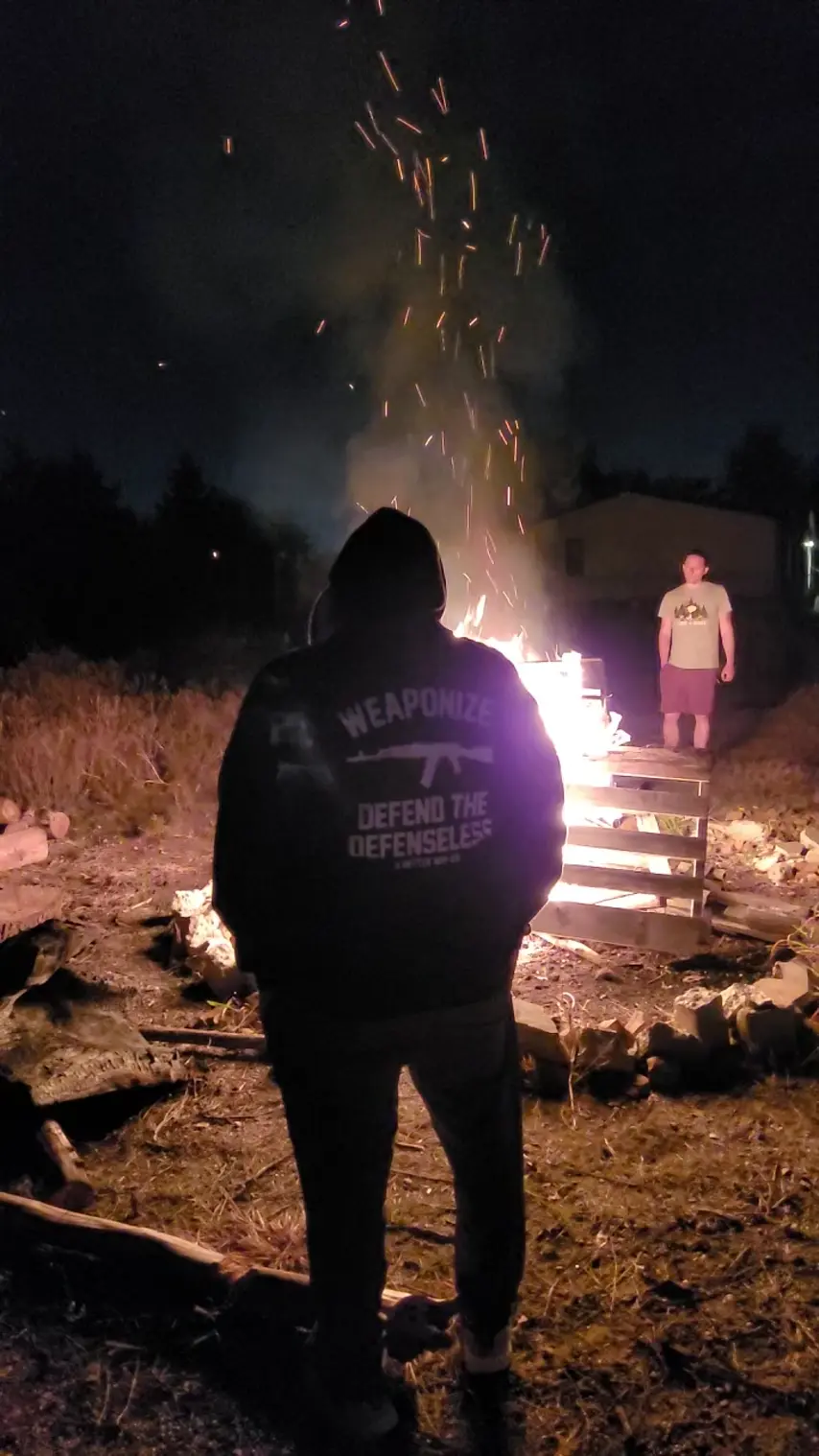 Community members at the bonfire